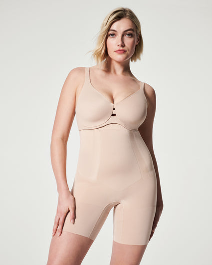 Buy Brown Check Shapewear Slim Trousers from Next Canada